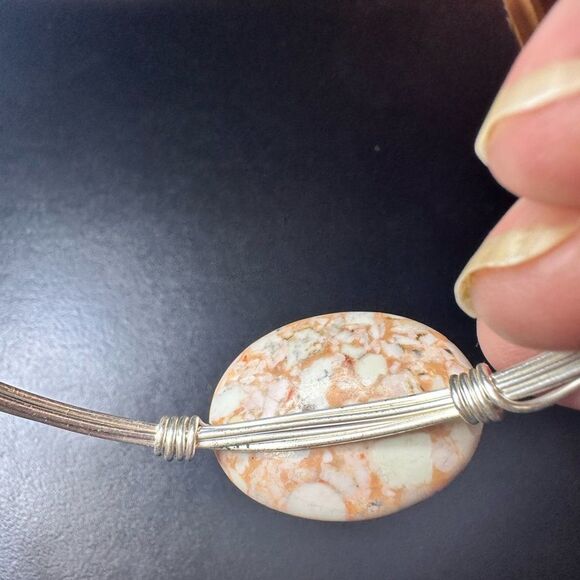 Silver wired metal bracelet with two oval brown swirled stones - Picture 5 of 8